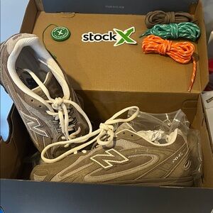 New Balance Women's Sneakers in Tan and White